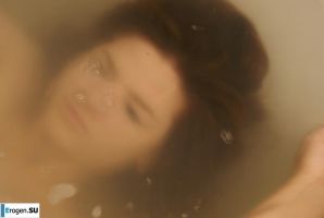 The girl in the bathroom plays with wax. Thumb 24