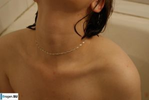 The girl in the bathroom plays with wax. Thumb 32