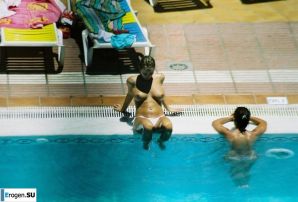 Girls sunbathe topless near the pool. Thumb 11