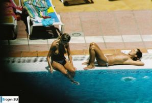 Girls sunbathe topless near the pool. Thumb 19