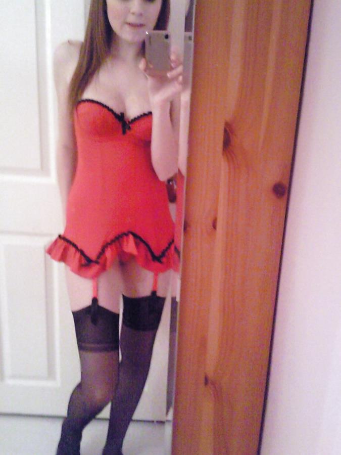 The cutest girl is photographed in the bedroom. Photo 14