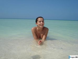 resting naked on the beach. Thumb 32