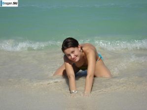 resting naked on the beach. Thumb 8