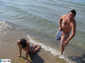 tanned girlfriends on a rocky shore. Thumb 4