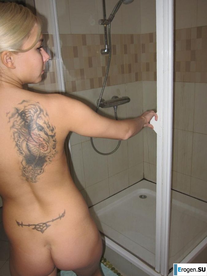 tattooed blonde walks naked. Part 2. Photo 39