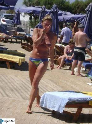 fun on a nudist beach. Thumb 3