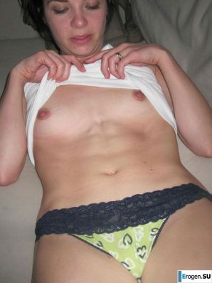 naked brunette and her legs behind her head. Thumb 12