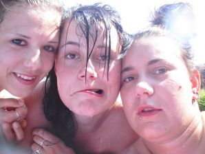 three girlfriends sunbathe in the yard with bare breasts. Thumb 10