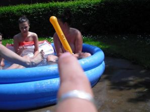 three girlfriends sunbathe in the yard with bare breasts. Thumb 25