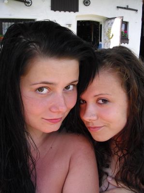 three girlfriends sunbathe in the yard with bare breasts. Thumb 30