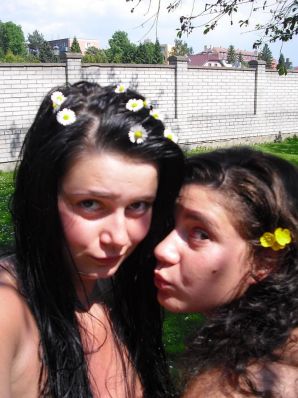 three girlfriends sunbathe in the yard with bare breasts. Thumb 36