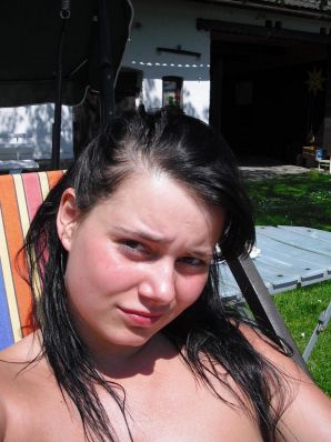 three girlfriends sunbathe in the yard with bare breasts. Thumb 9