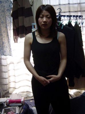 the Korean woman undressed and spread her legs. Thumb 9