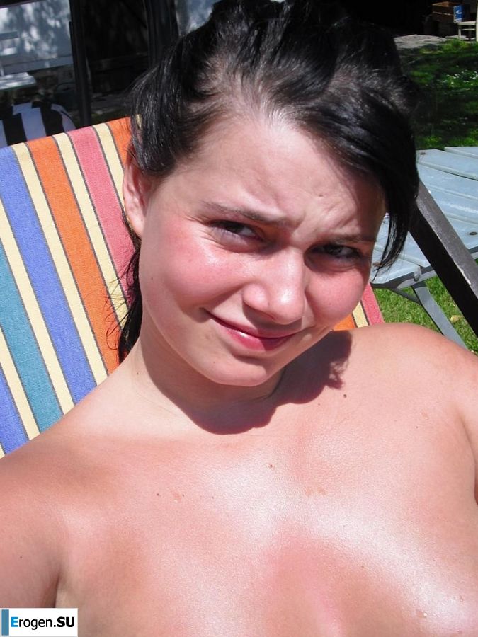 three girlfriends sunbathe in the yard with bare breasts. Part 2. Photo 3