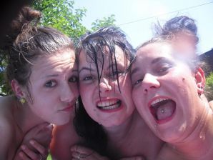 three girlfriends sunbathe in the yard with bare breasts. Part 2. Thumb 12