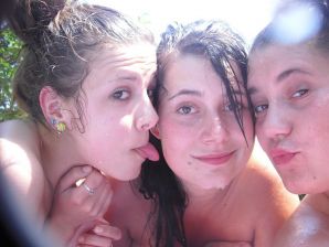 three girlfriends sunbathe in the yard with bare breasts. Part 2. Thumb 13