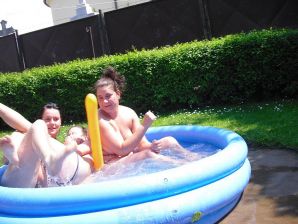 three girlfriends sunbathe in the yard with bare breasts. Part 2. Thumb 20