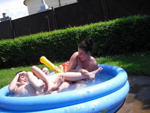 three girlfriends sunbathe in the yard with bare breasts. Part 2. Thumb 21