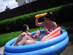 three girlfriends sunbathe in the yard with bare breasts. Part 2. Thumb 22