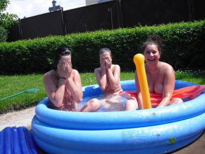 three girlfriends sunbathe in the yard with bare breasts. Part 2. Thumb 24