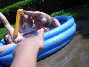 three girlfriends sunbathe in the yard with bare breasts. Part 2. Thumb 25