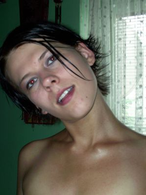 A tanned girl is spinning naked in a room. Thumb 30