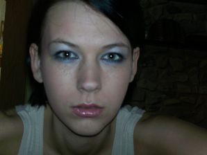 A tanned girl is spinning naked in a room. Thumb 6