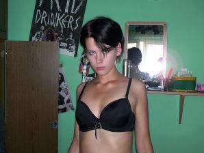 A tanned girl is spinning naked in a room. Thumb 8