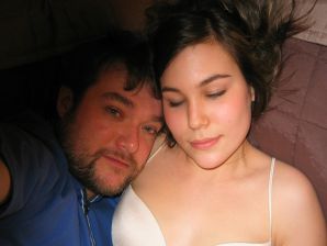 A young Asian girl is lying in bed after sex. Thumb 8