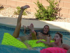 Slender girls light at a sex party by the pool. Thumb 35