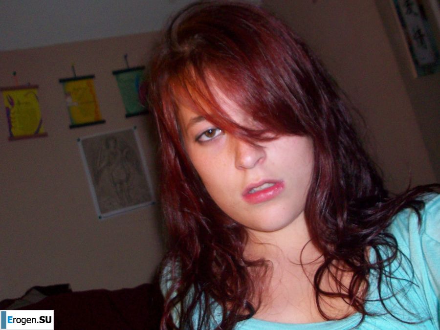 The naughty redhead girl undressed and engaged in passionate sex. Photo 6