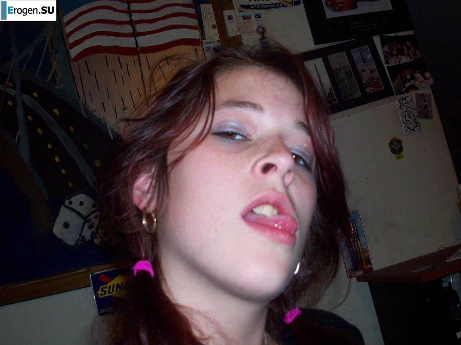 The naughty redhead girl undressed and engaged in passionate sex. Photo 7