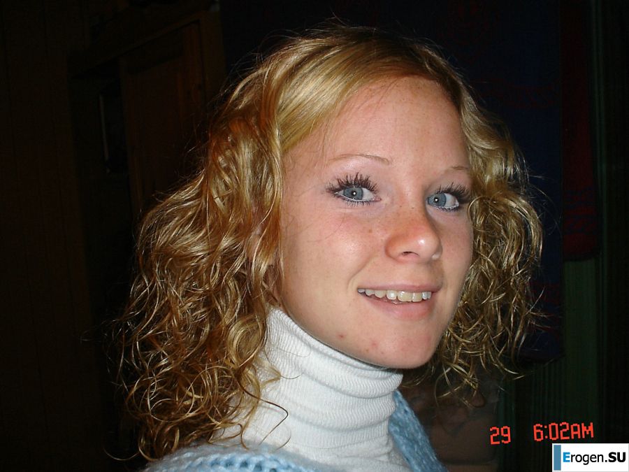 A blue-eyed minx with a pierced nipple plays with her panties. Photo 39