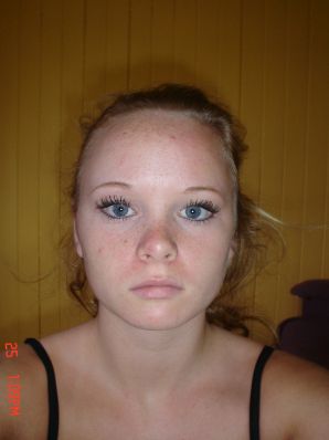 A blue-eyed minx with a pierced nipple plays with her panties. Thumb 32