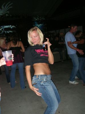 A pretty blonde is laid bare in the toilet and spreads her legs in bed. Thumb 36