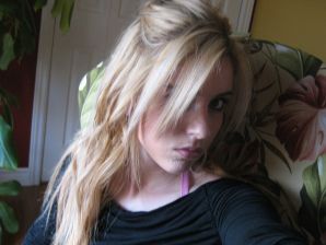 Chic blonde poses without a bra in the bathroom in front of the mirror. Thumb 7