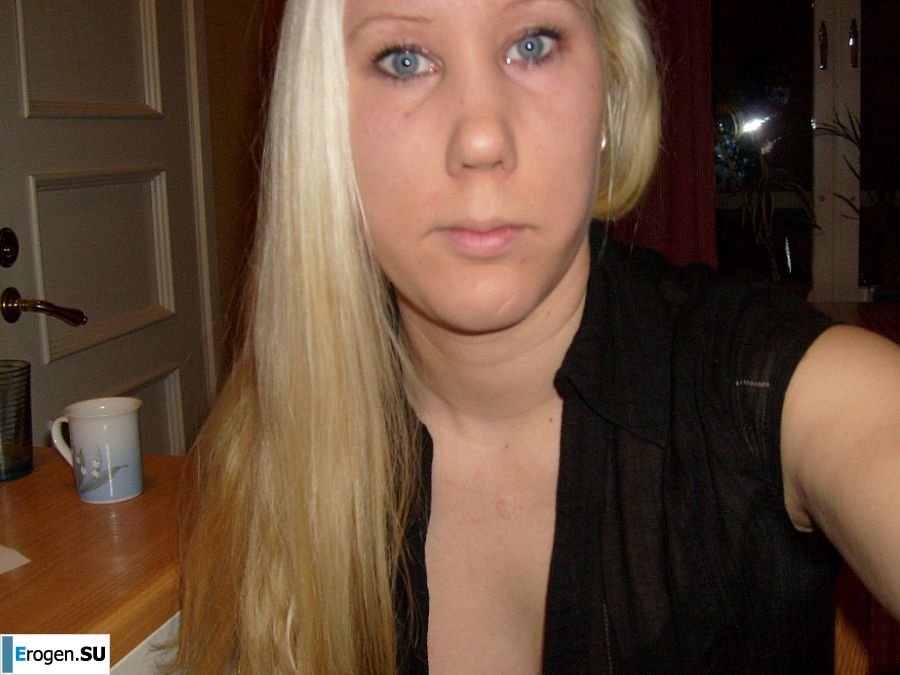 The blonde opened her labia and showed a wet vagina. Photo 12