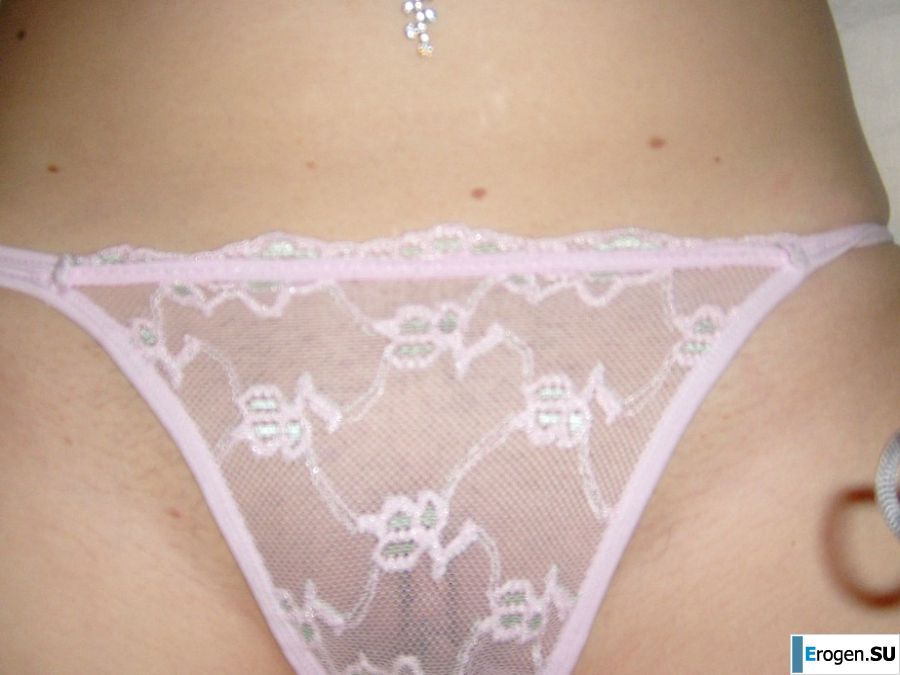 The blonde opened her labia and showed a wet vagina. Photo 15