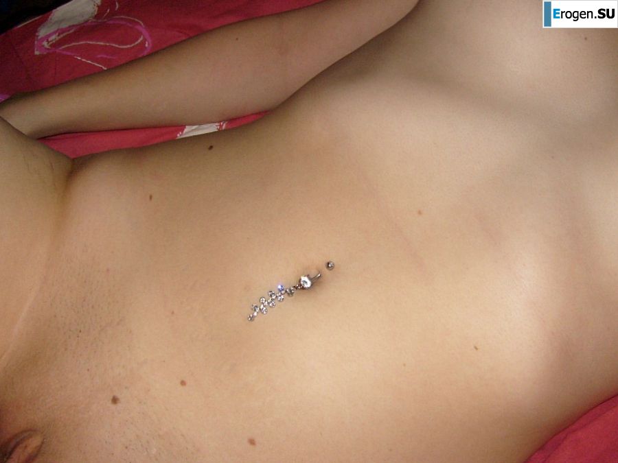 The blonde opened her labia and showed a wet vagina. Photo 24