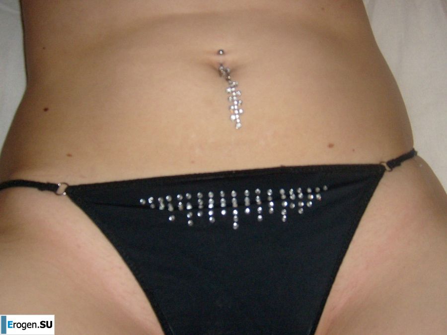 The blonde opened her labia and showed a wet vagina. Photo 8