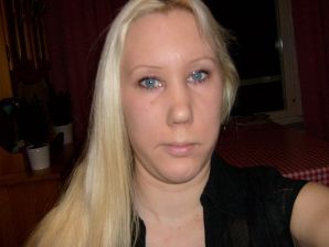 The blonde opened her labia and showed a wet vagina. Thumb 11