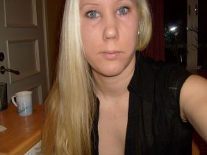 The blonde opened her labia and showed a wet vagina. Thumb 12