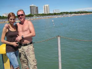 A slender beauty undresses and twists a booty in front of her man. Thumb 39