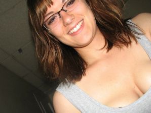 A girl with large breasts poses in clothes and then undresses. Part 2. Thumb 18