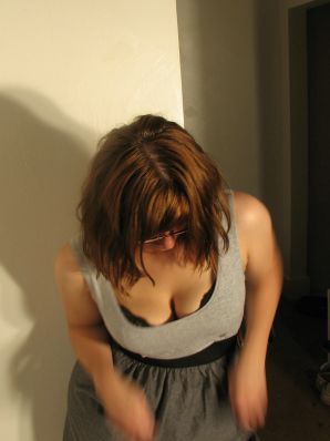 A girl with large breasts poses in clothes and then undresses. Part 2. Thumb 25