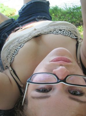 A girl with large breasts poses in clothes and then undresses. Part 2. Thumb 6