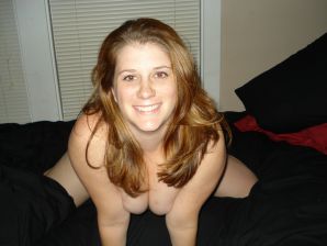 The seductive female is naked and shows a striptease, spreading her legs. Thumb 10