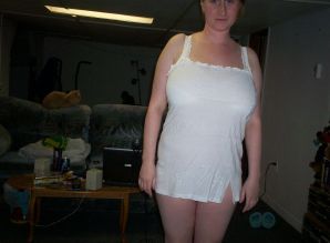 Busty woman posing in short dresses. Thumb 18