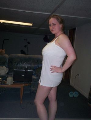 Busty woman posing in short dresses. Thumb 19