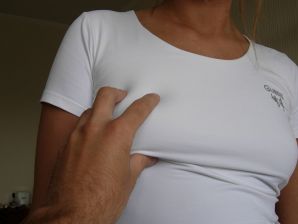 Shameless blonde in a white T-shirt takes off her panties and becomes cancer. Thumb 28